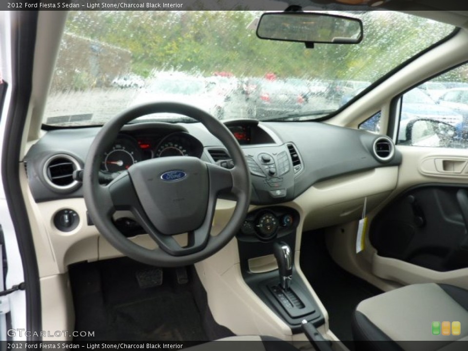 Light Stone/Charcoal Black Interior Dashboard for the 2012 Ford Fiesta S Sedan #54517076