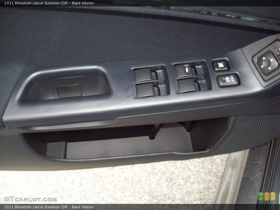 Black Interior Controls for the 2011 Mitsubishi Lancer Evolution GSR #54528767