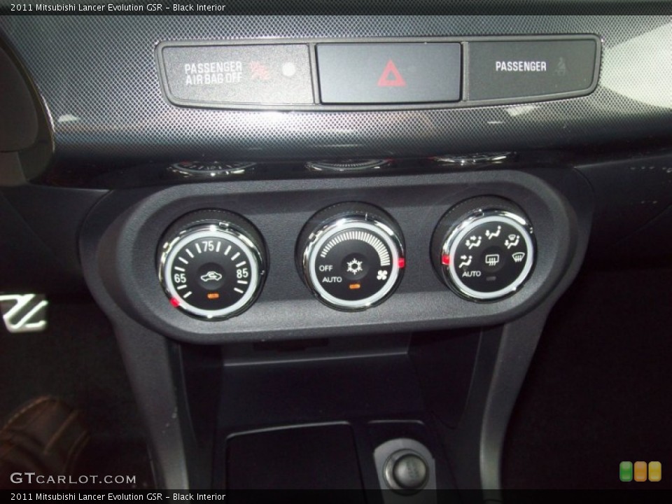 Black Interior Controls for the 2011 Mitsubishi Lancer Evolution GSR #54528802