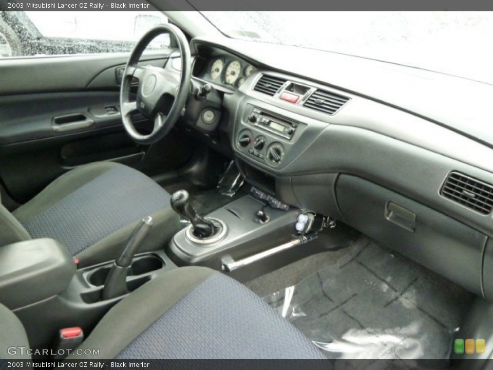 Black Interior Dashboard for the 2003 Mitsubishi Lancer OZ Rally #54531506