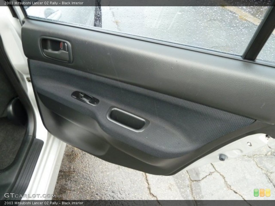 Black Interior Door Panel for the 2003 Mitsubishi Lancer OZ Rally #54531521