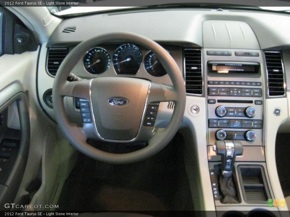 Light Stone Interior Dashboard for the 2012 Ford Taurus SE #54537670