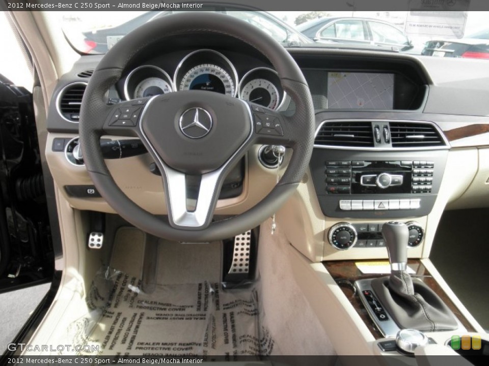 Almond Beige/Mocha Interior Dashboard for the 2012 Mercedes-Benz C 250 Sport #54538213