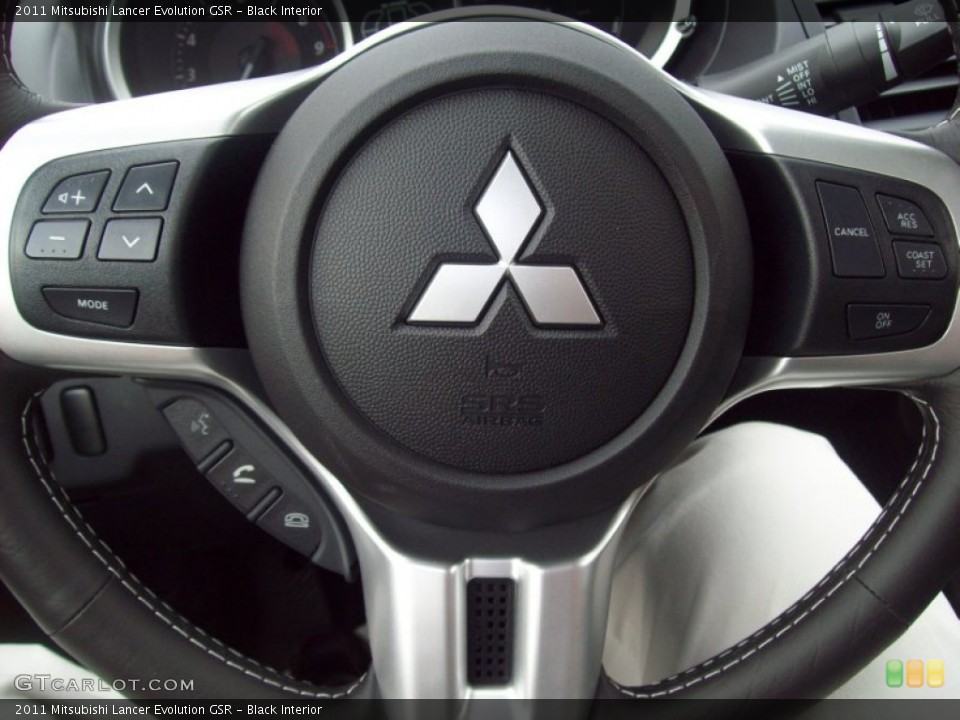 Black Interior Controls for the 2011 Mitsubishi Lancer Evolution GSR #54543663