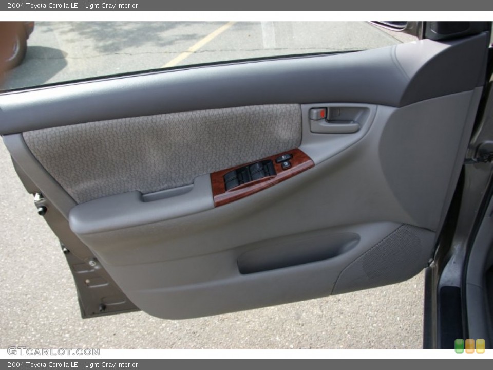 Light Gray Interior Door Panel for the 2004 Toyota Corolla LE #54563793