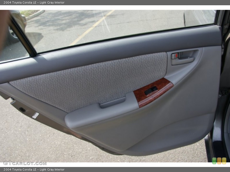 Light Gray Interior Door Panel for the 2004 Toyota Corolla LE #54563820