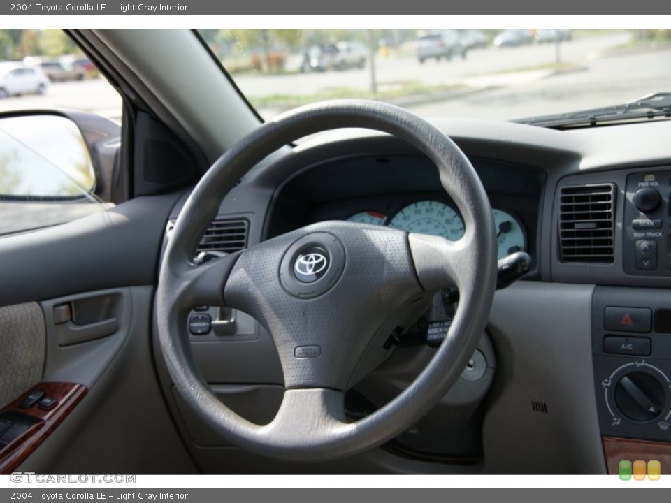 Light Gray Interior Steering Wheel for the 2004 Toyota Corolla LE #54563883
