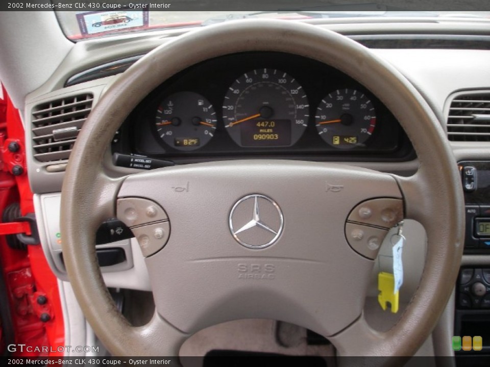 Oyster Interior Steering Wheel for the 2002 Mercedes-Benz CLK 430 Coupe #54566781
