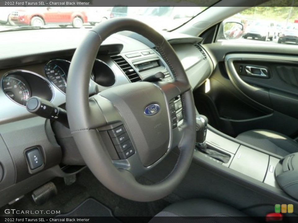 Charcoal Black Interior Steering Wheel for the 2012 Ford Taurus SEL #54579662