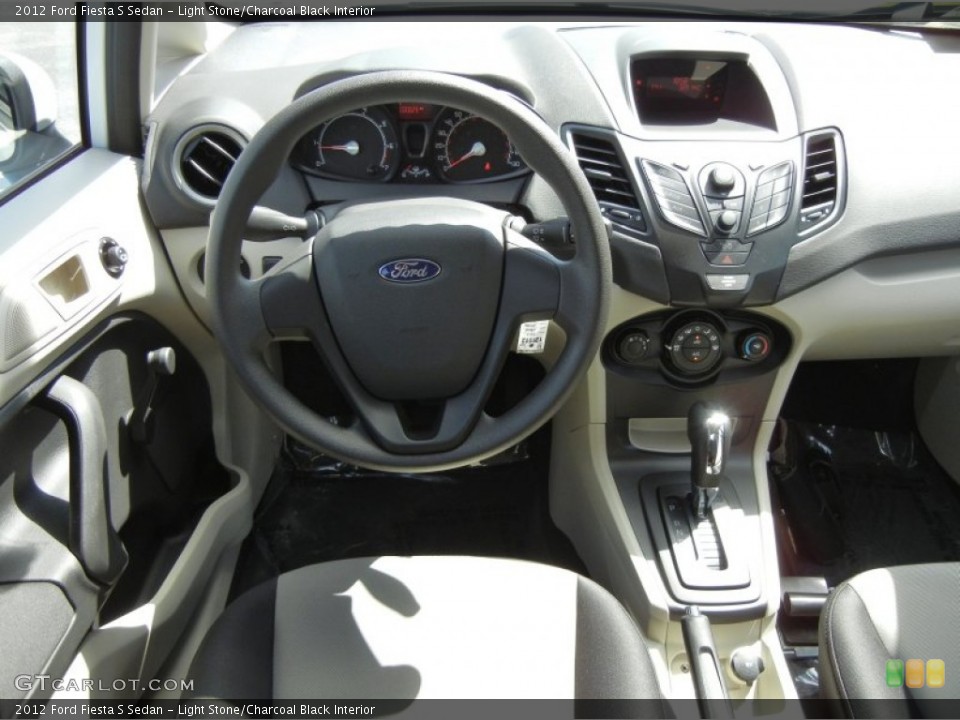 Light Stone/Charcoal Black Interior Dashboard for the 2012 Ford Fiesta S Sedan #54580709