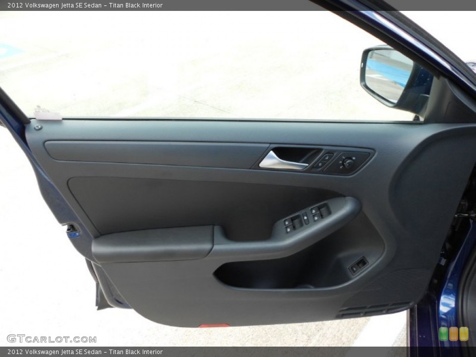 Titan Black Interior Door Panel for the 2012 Volkswagen Jetta SE Sedan #54585533