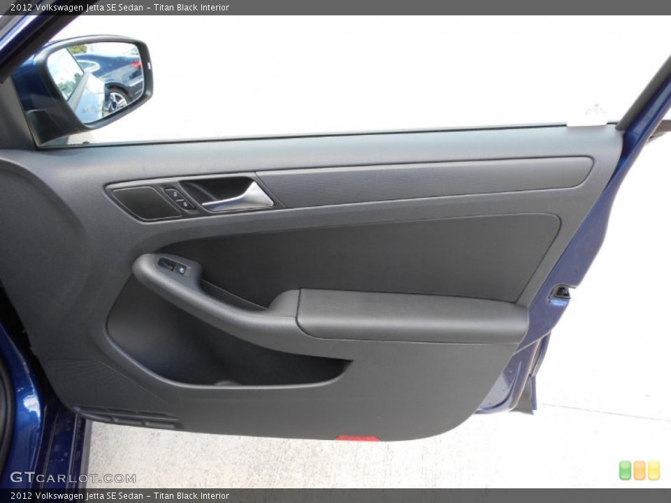 Titan Black Interior Door Panel for the 2012 Volkswagen Jetta SE Sedan #54585550