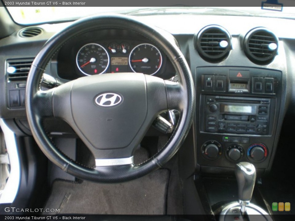 Black Interior Dashboard for the 2003 Hyundai Tiburon GT V6 #54608061
