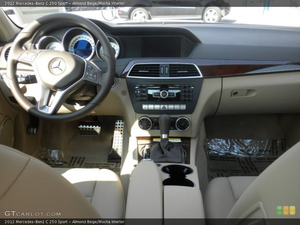 Almond Beige/Mocha Interior Dashboard for the 2012 Mercedes-Benz C 250 Sport #54609813