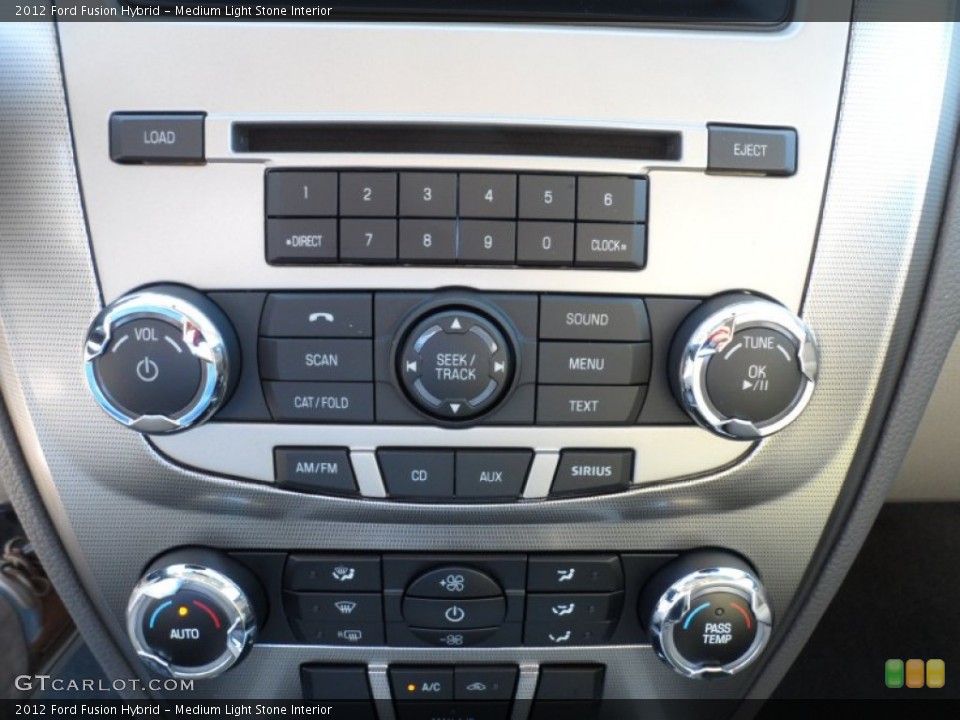Medium Light Stone Interior Controls for the 2012 Ford Fusion Hybrid #54622035