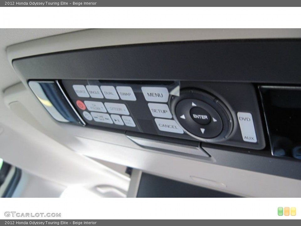 Beige Interior Controls for the 2012 Honda Odyssey Touring Elite #54649596