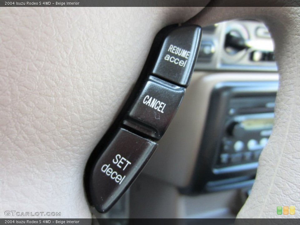Beige Interior Controls for the 2004 Isuzu Rodeo S 4WD #54653784