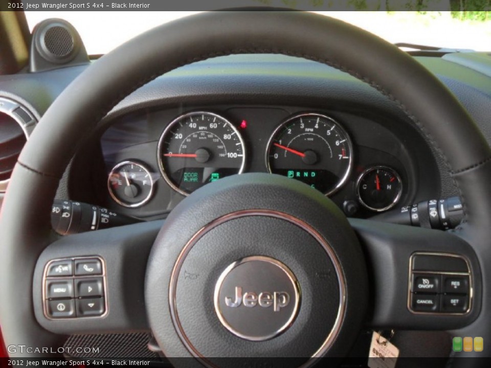 Black Interior Steering Wheel for the 2012 Jeep Wrangler Sport S 4x4 #54667157