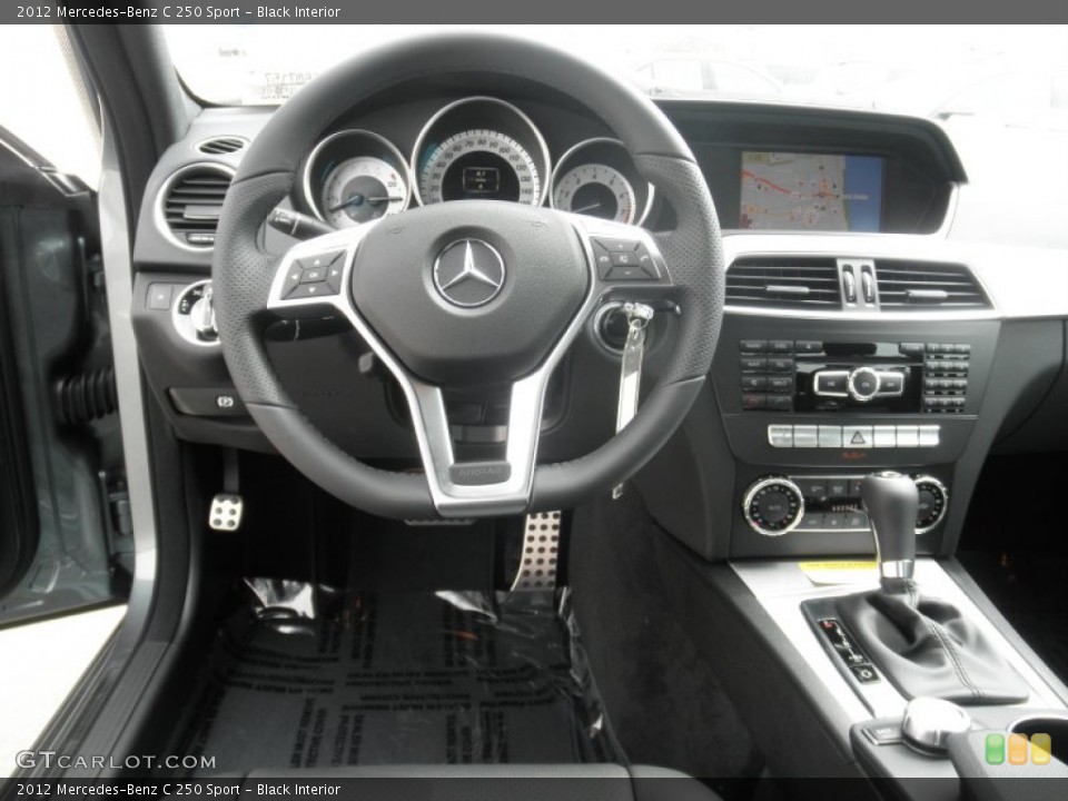 Black Interior Dashboard for the 2012 Mercedes-Benz C 250 Sport #54691963