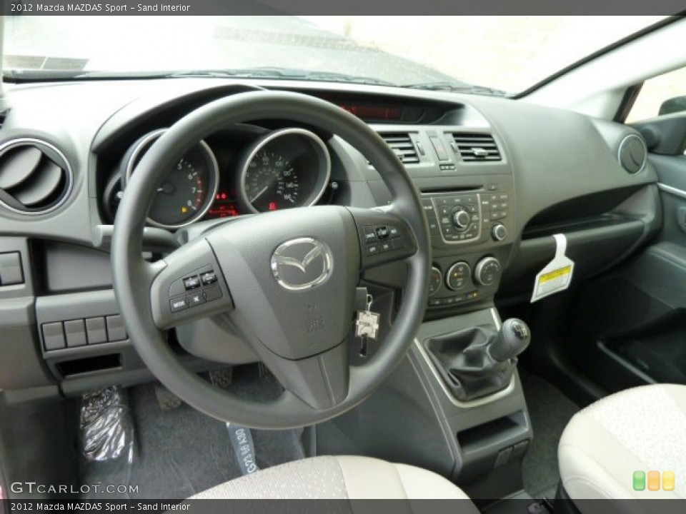Sand Interior Dashboard for the 2012 Mazda MAZDA5 Sport #54703474