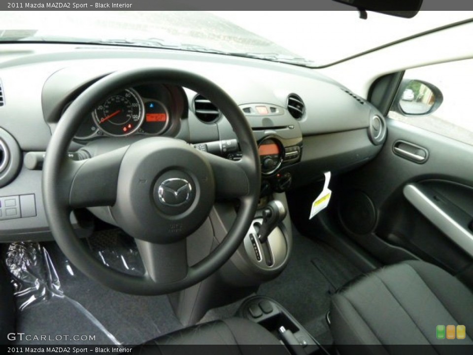 Black Interior Dashboard for the 2011 Mazda MAZDA2 Sport #54704152