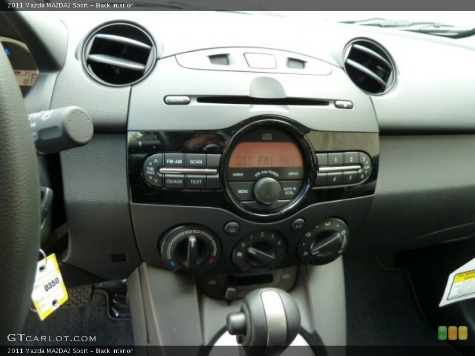 Black Interior Controls for the 2011 Mazda MAZDA2 Sport #54704368