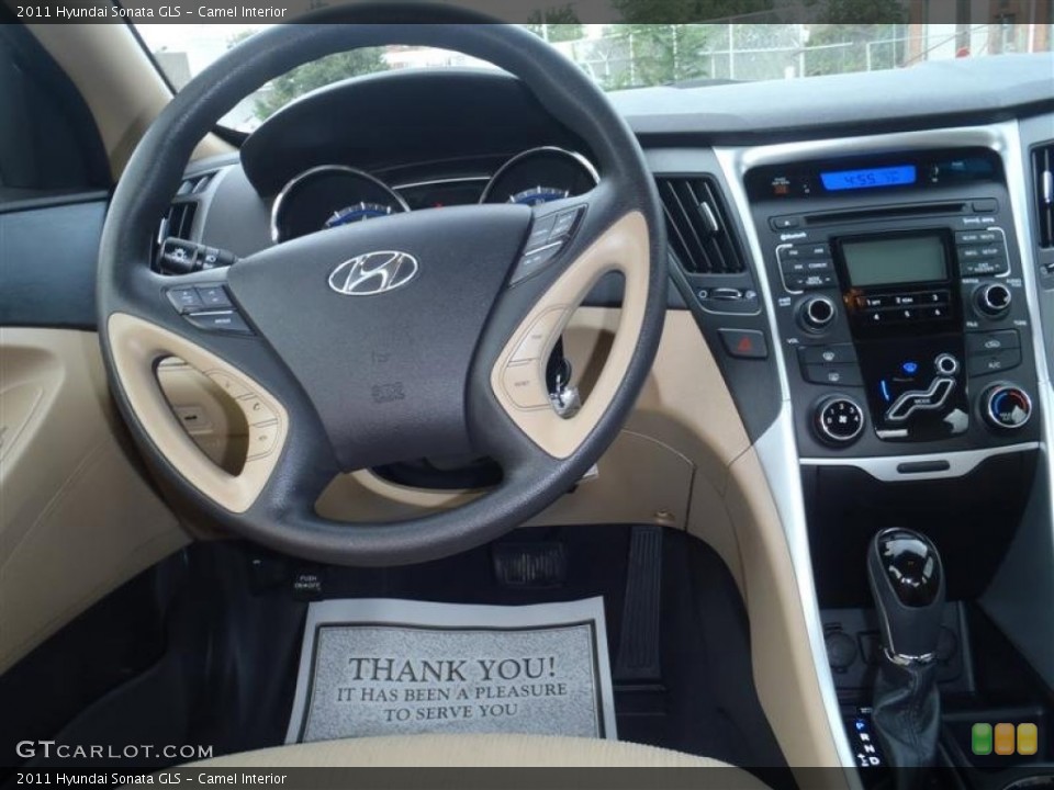 Camel Interior Steering Wheel for the 2011 Hyundai Sonata GLS #54709249