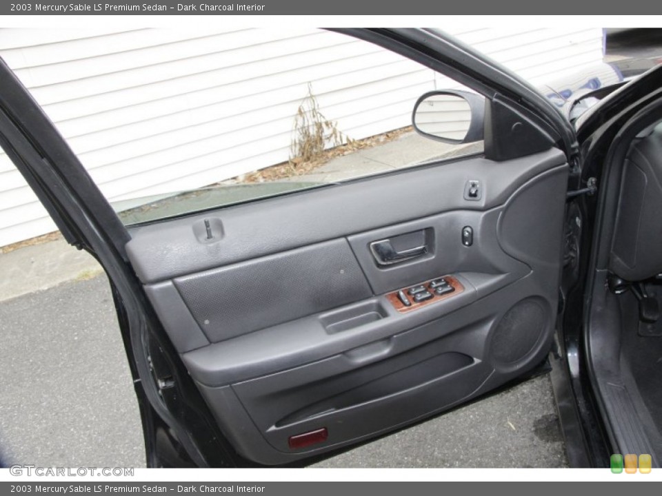 Dark Charcoal Interior Door Panel for the 2003 Mercury Sable LS Premium Sedan #54725182