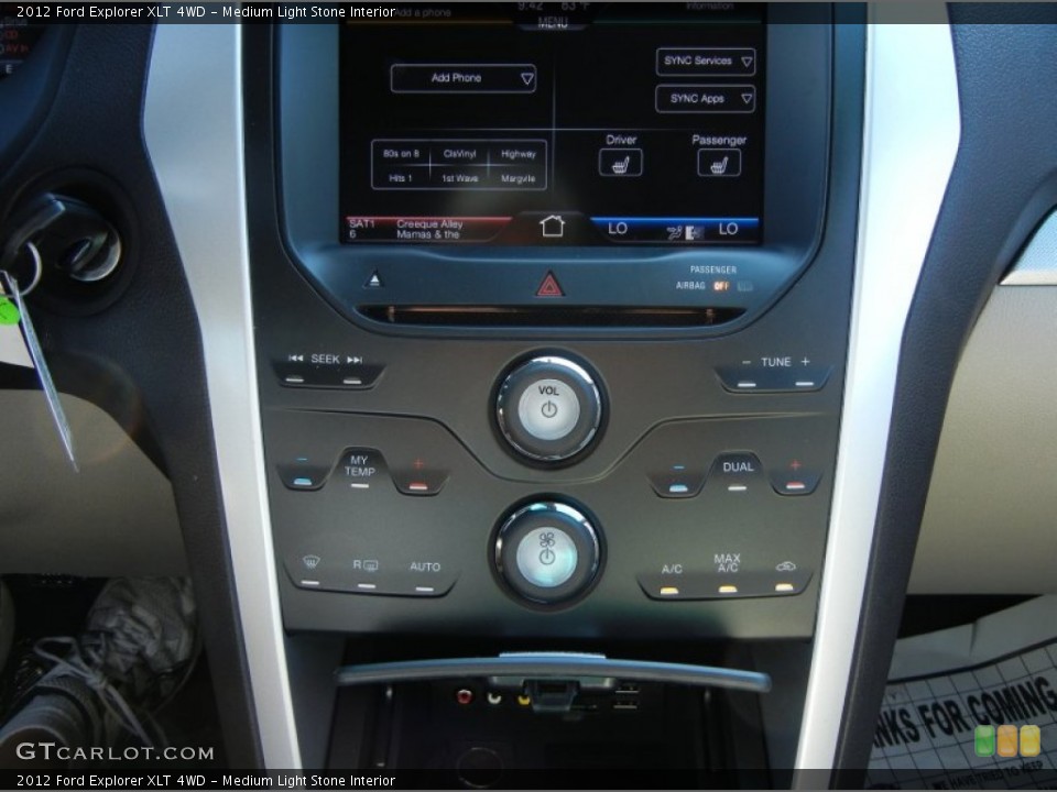Medium Light Stone Interior Controls for the 2012 Ford Explorer XLT 4WD #54755853