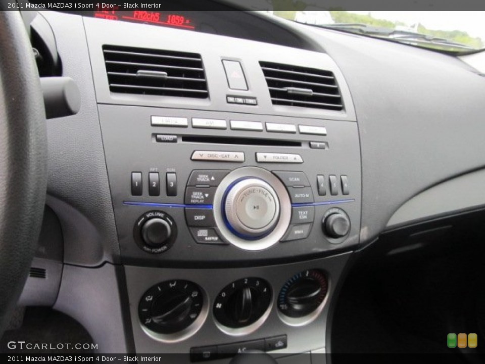 Black Interior Controls for the 2011 Mazda MAZDA3 i Sport 4 Door #54770700
