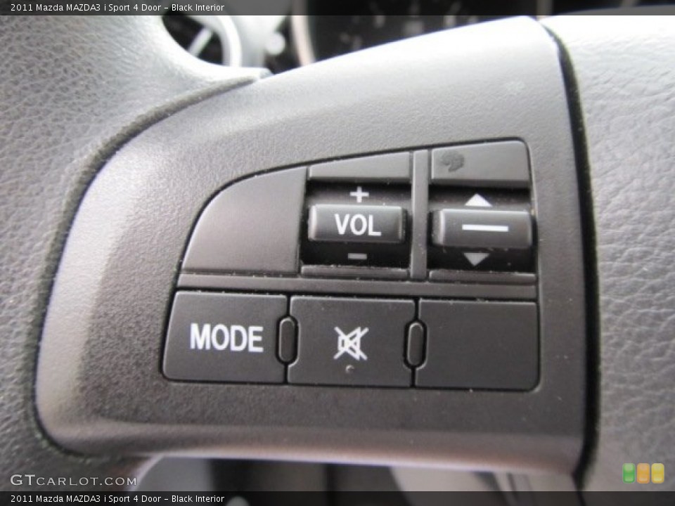 Black Interior Controls for the 2011 Mazda MAZDA3 i Sport 4 Door #54770742