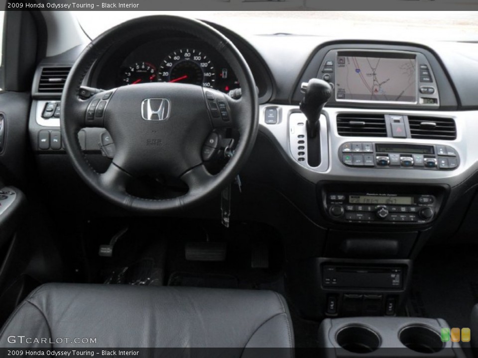 Black Interior Dashboard for the 2009 Honda Odyssey Touring #54782424