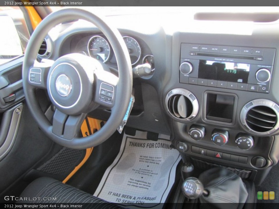 Black Interior Dashboard for the 2012 Jeep Wrangler Sport 4x4 #54795277