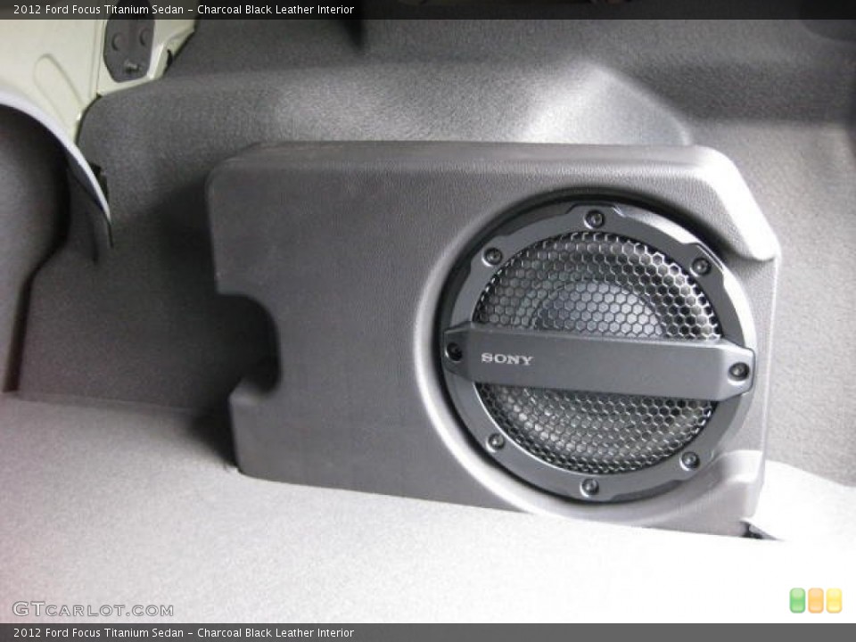 Charcoal Black Leather Interior Audio System for the 2012 Ford Focus Titanium Sedan #54810643