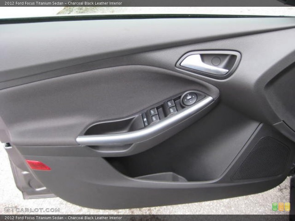Charcoal Black Leather Interior Door Panel for the 2012 Ford Focus Titanium Sedan #54810667