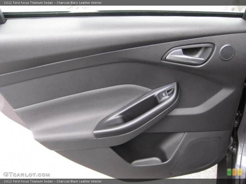 Charcoal Black Leather Interior Door Panel for the 2012 Ford Focus Titanium Sedan #54810694