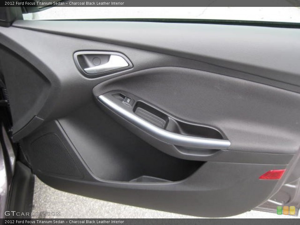 Charcoal Black Leather Interior Door Panel for the 2012 Ford Focus Titanium Sedan #54810718