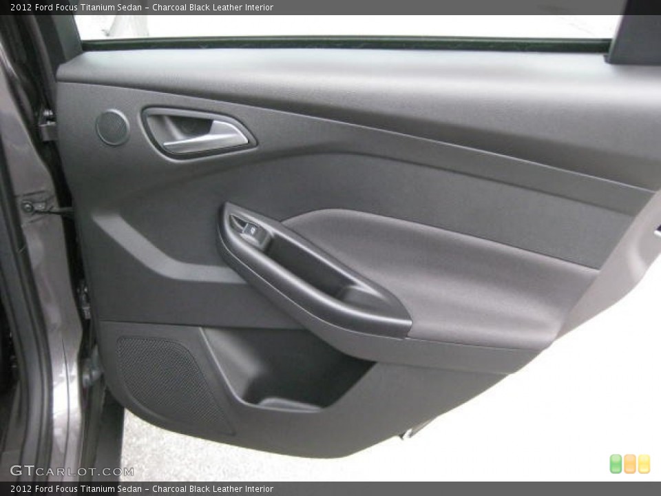Charcoal Black Leather Interior Door Panel for the 2012 Ford Focus Titanium Sedan #54810744