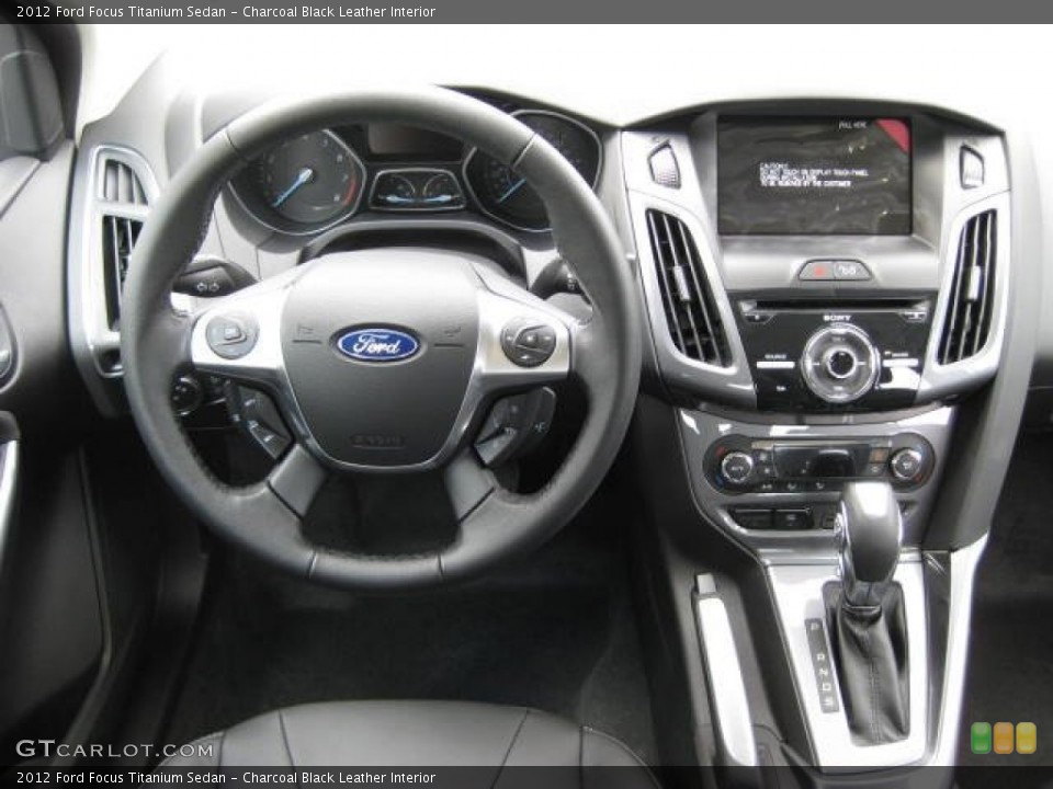 Charcoal Black Leather Interior Dashboard for the 2012 Ford Focus Titanium Sedan #54810751