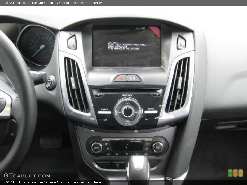 Charcoal Black Leather Interior Controls for the 2012 Ford Focus Titanium Sedan #54810760