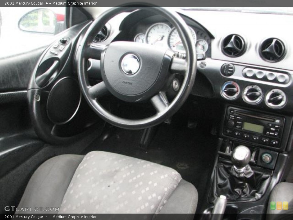 Medium Graphite Interior Dashboard for the 2001 Mercury Cougar i4 #54865696