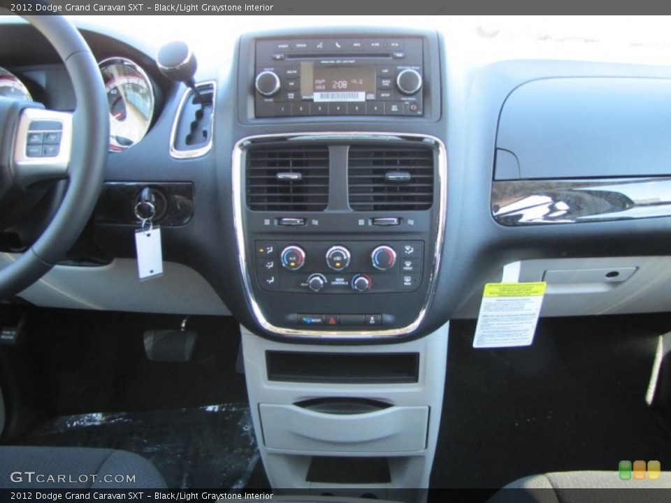 Black/Light Graystone Interior Controls for the 2012 Dodge Grand Caravan SXT #54865702