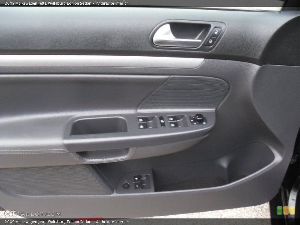 Anthracite Interior Door Panel for the 2009 Volkswagen Jetta Wolfsburg Edition Sedan #54884362