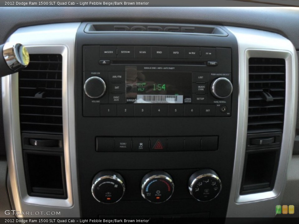 Light Pebble Beige/Bark Brown Interior Controls for the 2012 Dodge Ram 1500 SLT Quad Cab #54894346
