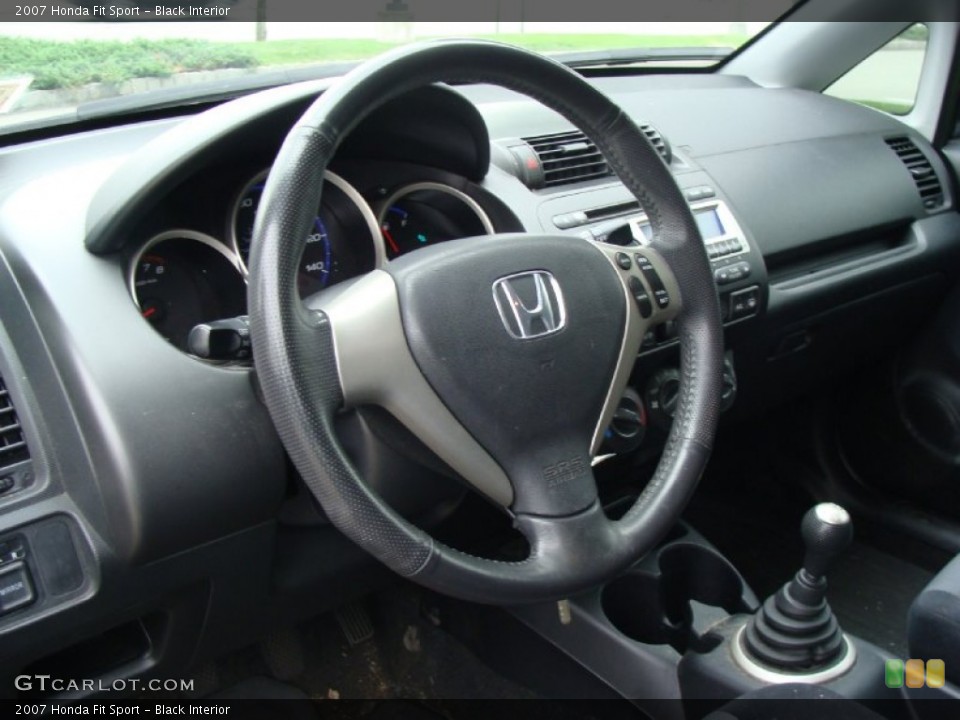 Black Interior Dashboard for the 2007 Honda Fit Sport #54897536