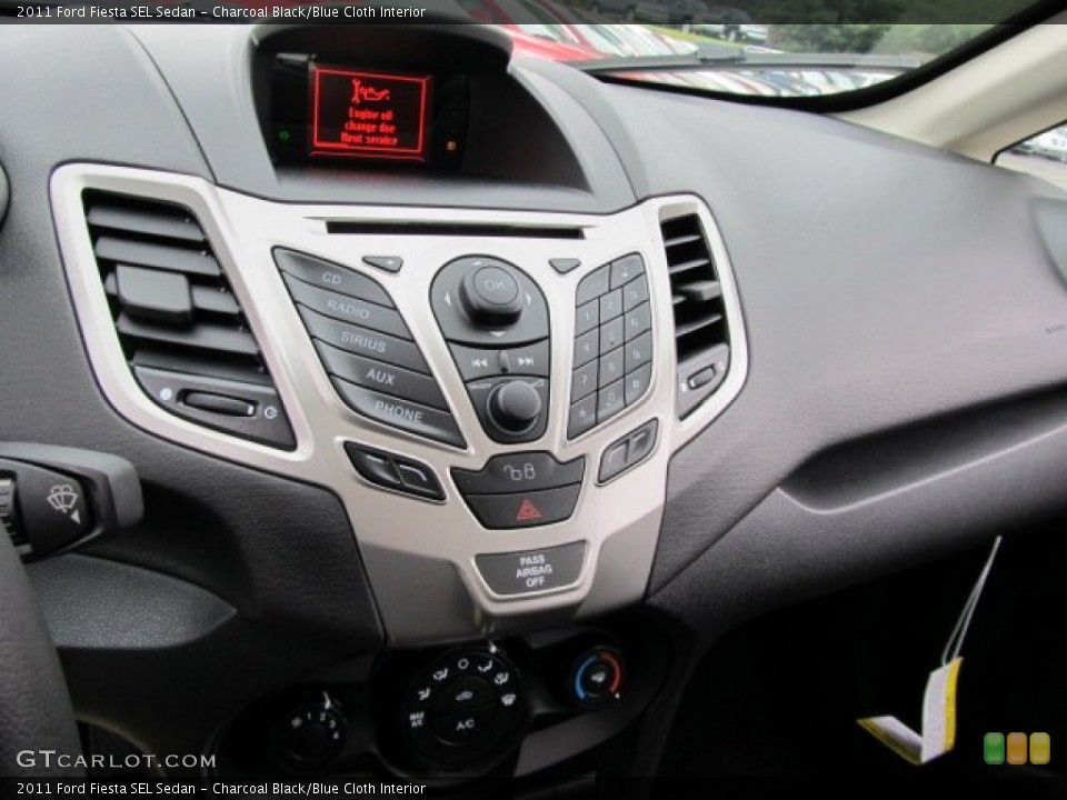 Charcoal Black/Blue Cloth Interior Controls for the 2011 Ford Fiesta SEL Sedan #54905495