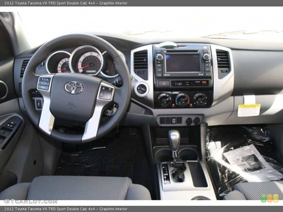 Graphite Interior Dashboard for the 2012 Toyota Tacoma V6 TRD Sport Double Cab 4x4 #54905687