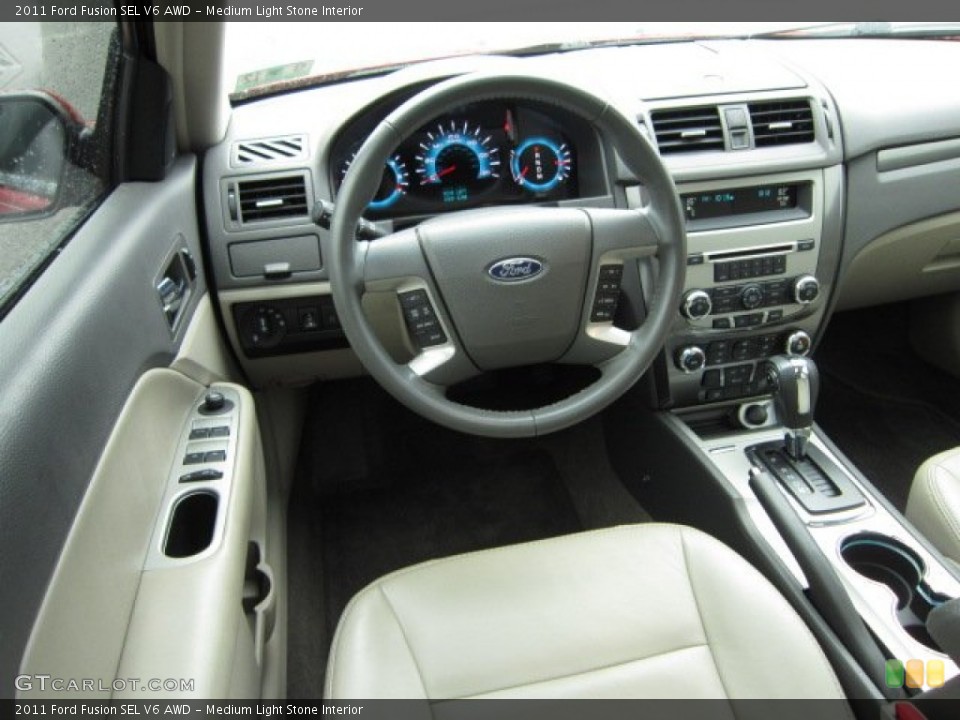 Medium Light Stone Interior Dashboard for the 2011 Ford Fusion SEL V6 AWD #54915421