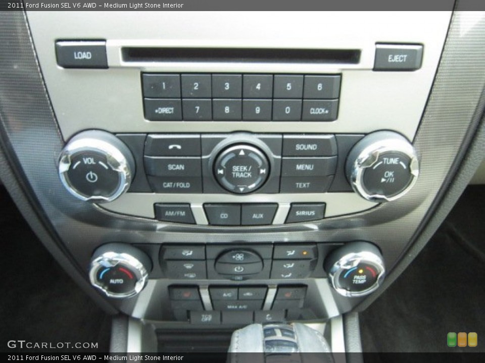 Medium Light Stone Interior Controls for the 2011 Ford Fusion SEL V6 AWD #54915457