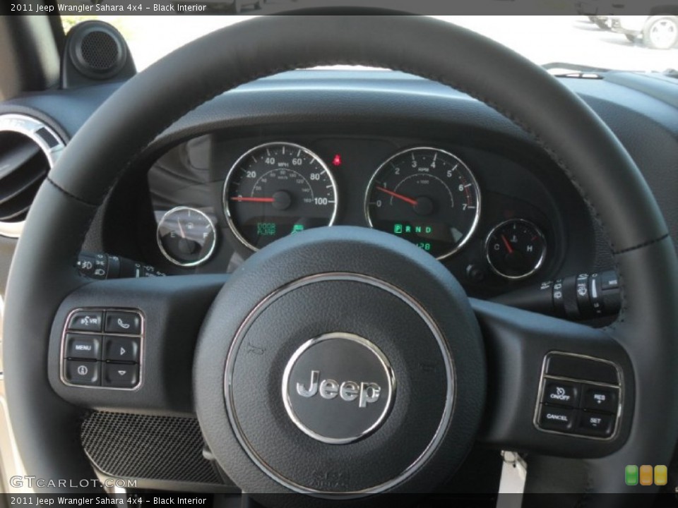 Black Interior Steering Wheel for the 2011 Jeep Wrangler Sahara 4x4 #54949047